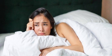 sad-and-gloomy-asian-girl-lying-in-her-bed-grimac-2023-11-27-05-07-12-utc-768x512